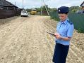 В Зее по требованию прокуратуры восстановлен опасный участок дороги, где ранее в грязи застрял мальчик
